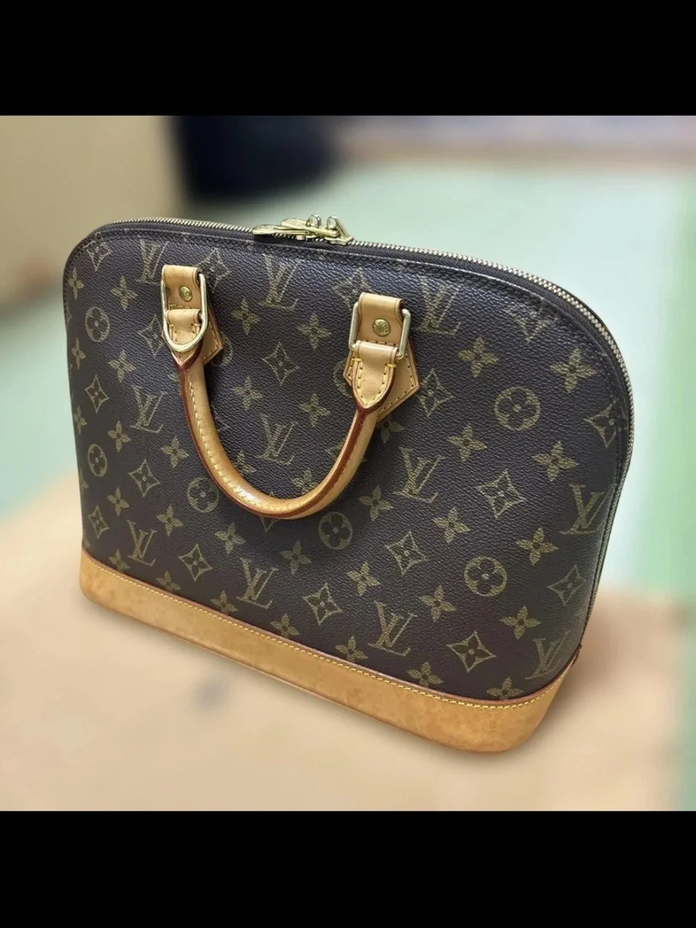 Louis Vuitton Brown Monogram Alma PM Handbag